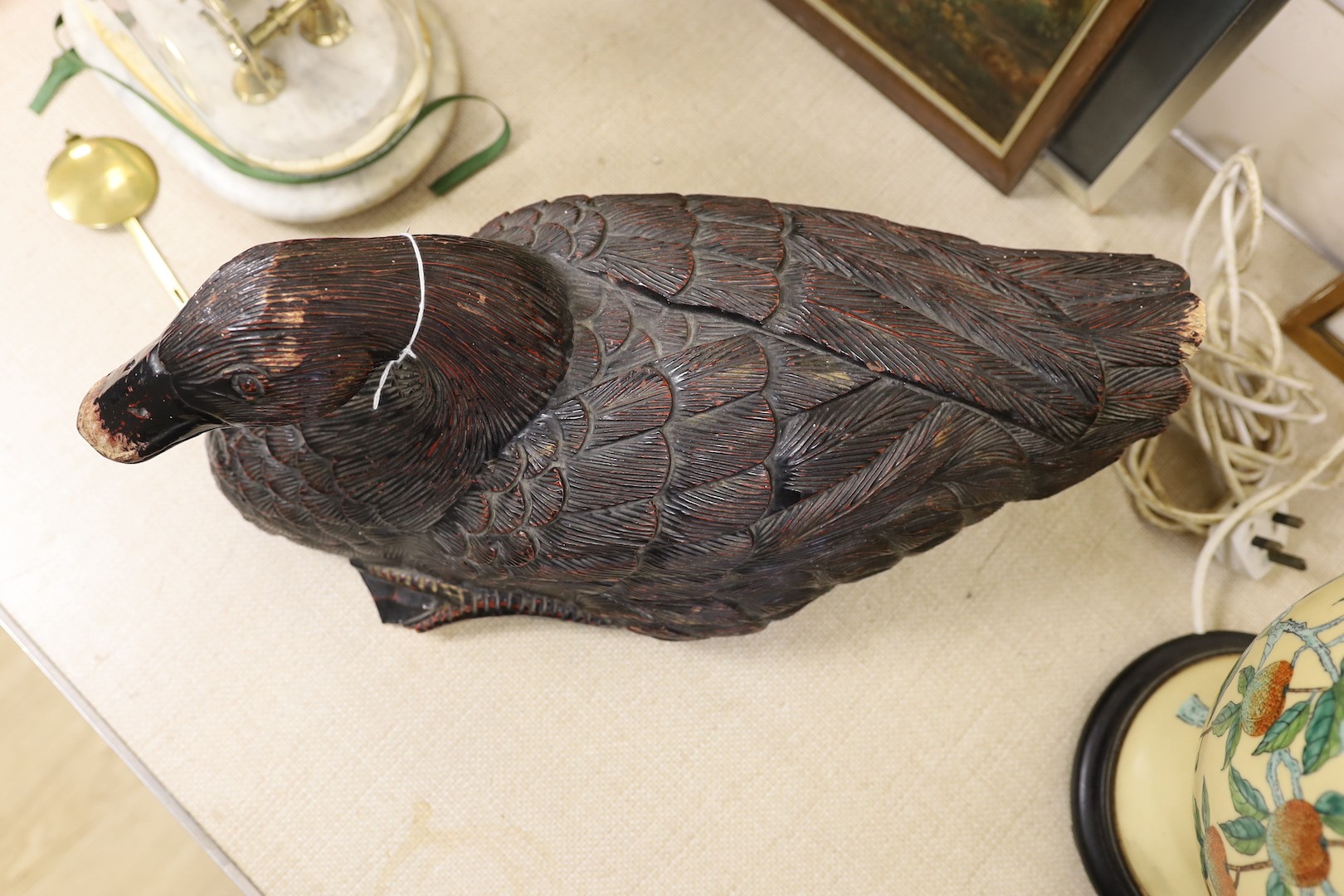 A large carved duck, 51 cms wide.